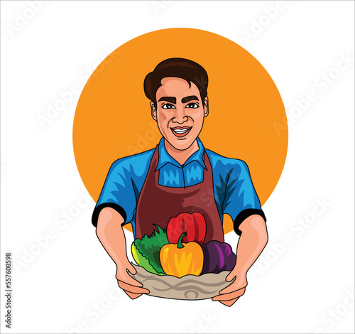 Asian happy male farmer in a red apron stands smiling to look at the camera holding basket full of raw fresh