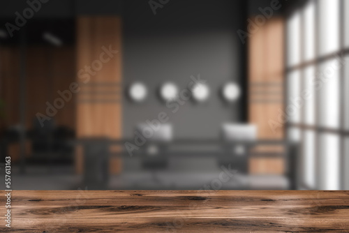 Wooden desk on blurred background of reception room interior. Mockup