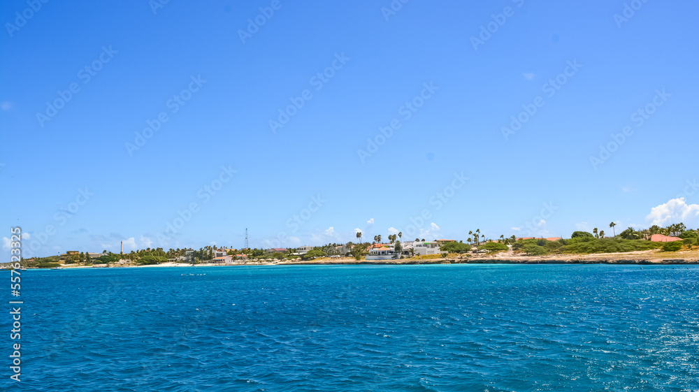 A beautiful coastal view on Aruba island from Caribbean sea. Space for text.	