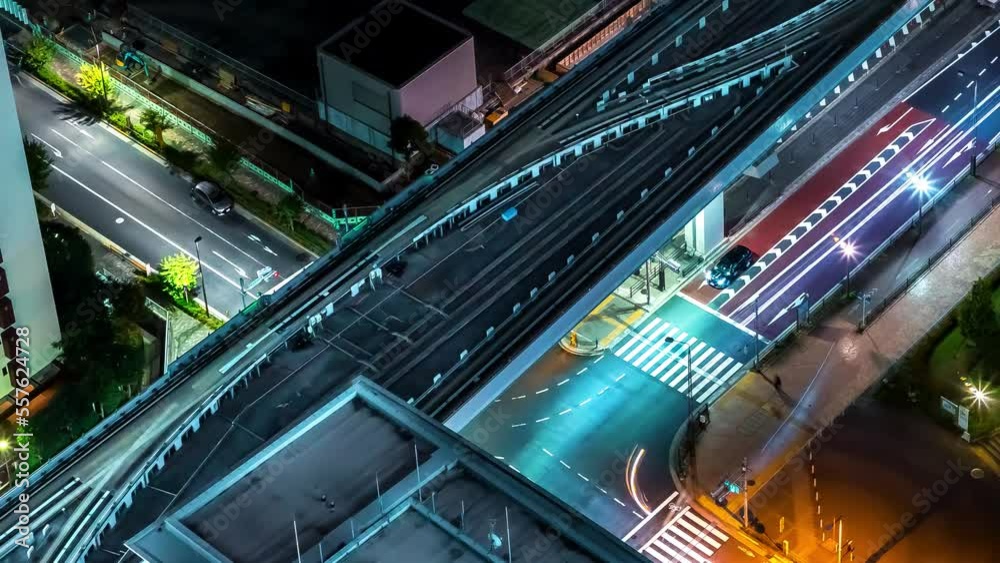 Time-lapse of trains of the Yurikamome arriving and departing from Toyosu Station, Tokyo, Japan at night Time-lapse of trains of the Yurikamome arriving and departing from Toyosu Station, Tokyo, Japan at night