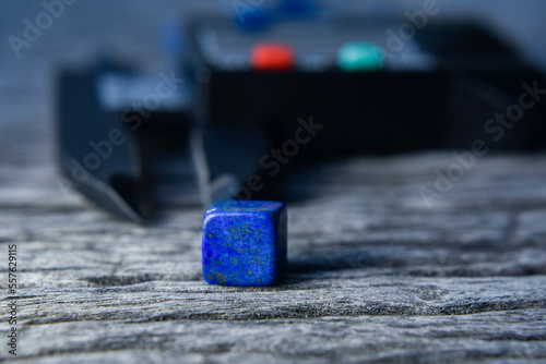 Lapis Is a beautiful natural gemstone on a wooden floor