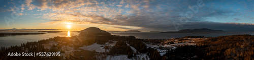 Aerial Winter Sunrise Over Hale Passage and Lummi Island. Snow blankets this lovely small island located minutes from Bellingham  Washington and accessed by a twenty one car ferry boat. 