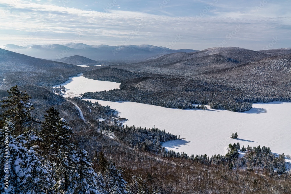 Fototapeta premium A winter morning seen from La Roche look point at Mont-Tremblant Nation Park in Quebec, Canada