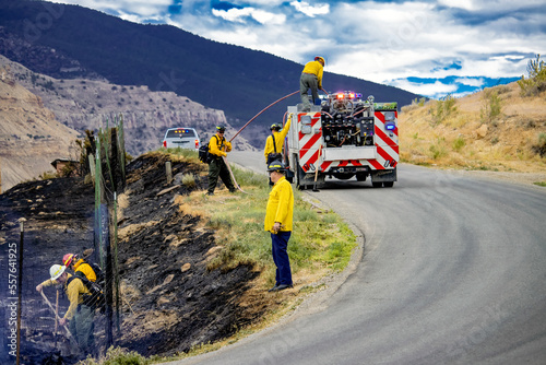 Firefighters working to battle a brush fire
