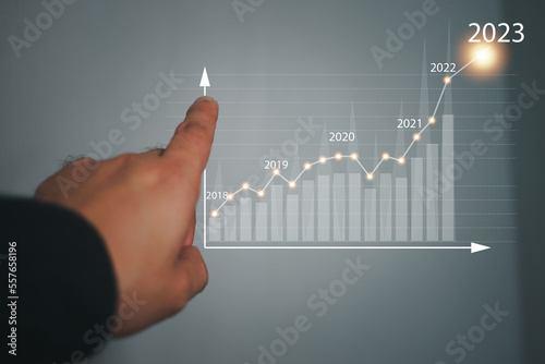 strategy planning business goals, target, Businessman analyzing company's financial balance sheet. Businessman calculates financial data for long-term investment. 