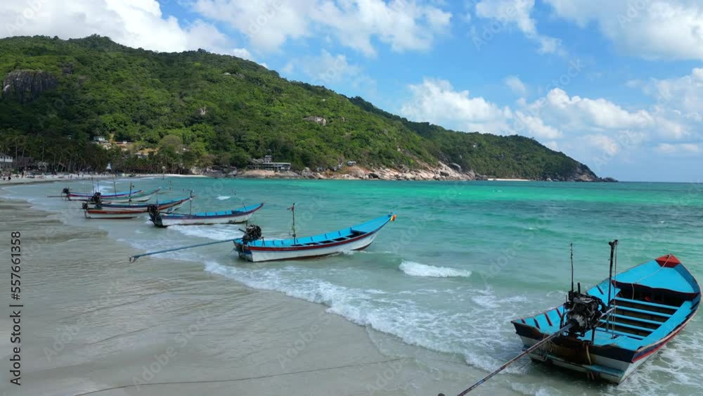 Aerial view of a amazing beach and longtail boats in Thailand. Aerial view of a amazing beach and longtail boats in Thailand.