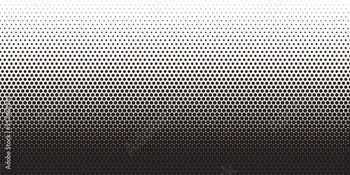 Halftone background. Black polka dot. Halftone pattern, pattern, texture, backdrop. Dotted background as design element.