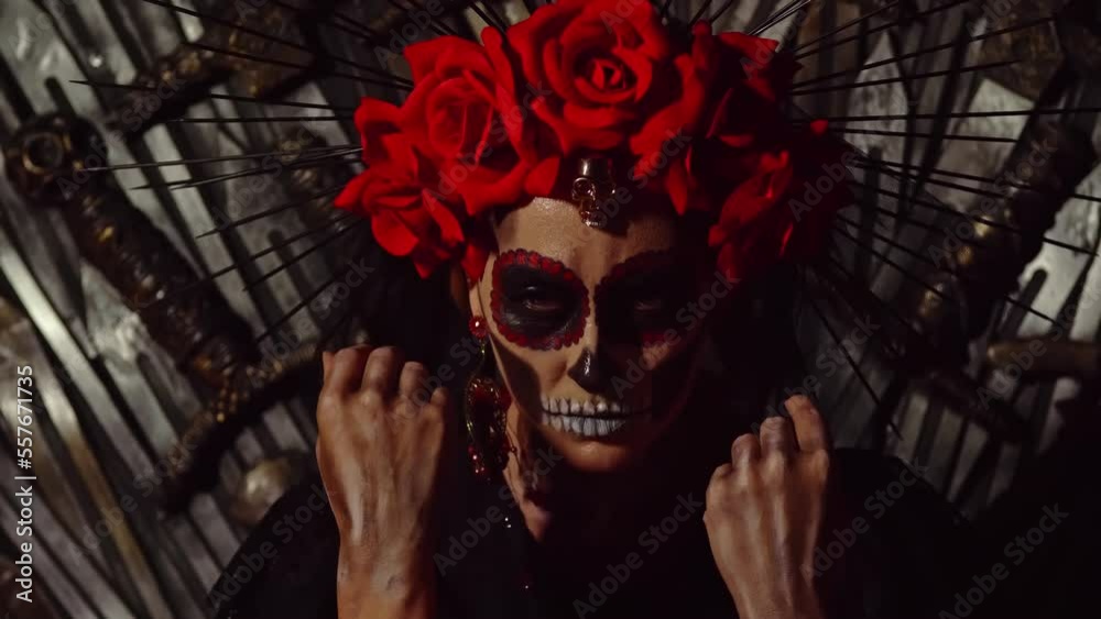 Carnival Day of the Dead The goddess of death in total darkness sits on a throne of iron swords and looks up