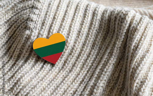 Flag of Lithuania in the shape of a heart on a wool sweater.