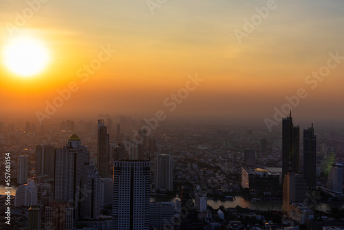 Sunset in the evening in a large metropolis Gorgeous panorama scenic of the sunset with cloud  No focus  specifically.