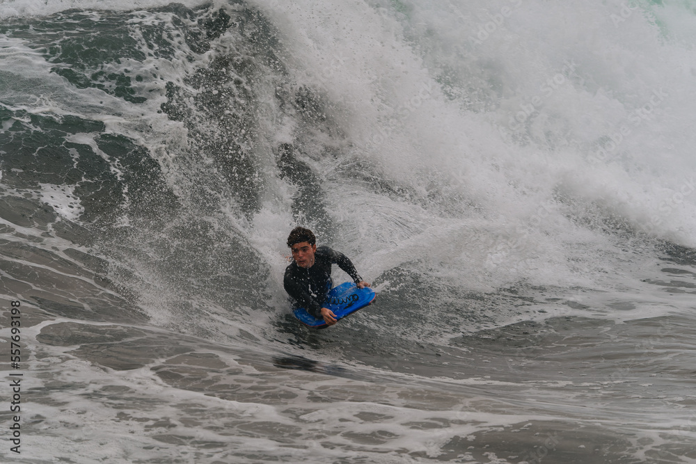 young bodyboarder surfs a wave in Gran Canaria. Canary Islands. Spain young bodyboarder surfs a wave in Gran Canaria. Canary Islands. Spain