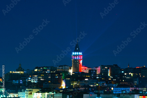 Galata Tower and spotlight rays. Istanbul background photo