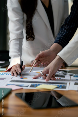 Group of young businesswoman working together. Creative business people in modern office