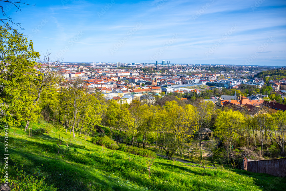 Sunny spring day in Petrin Gardens with Prague city lookout, Czech Republic