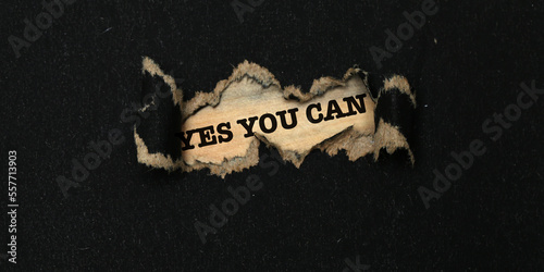 Motivational quote reveal on torn paper. Yes You can.