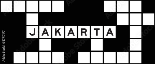 Alphabet letter in word jakarta on crossword puzzle background