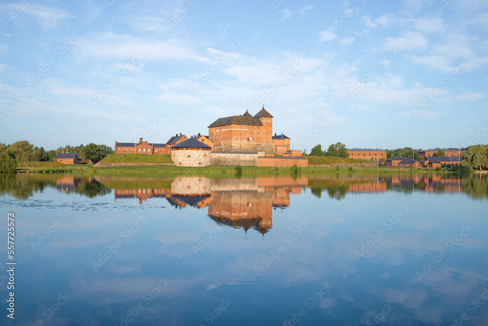 The ancient fortress of the city of Hameenlinna in the summer landscape on a sunny morning. Finland