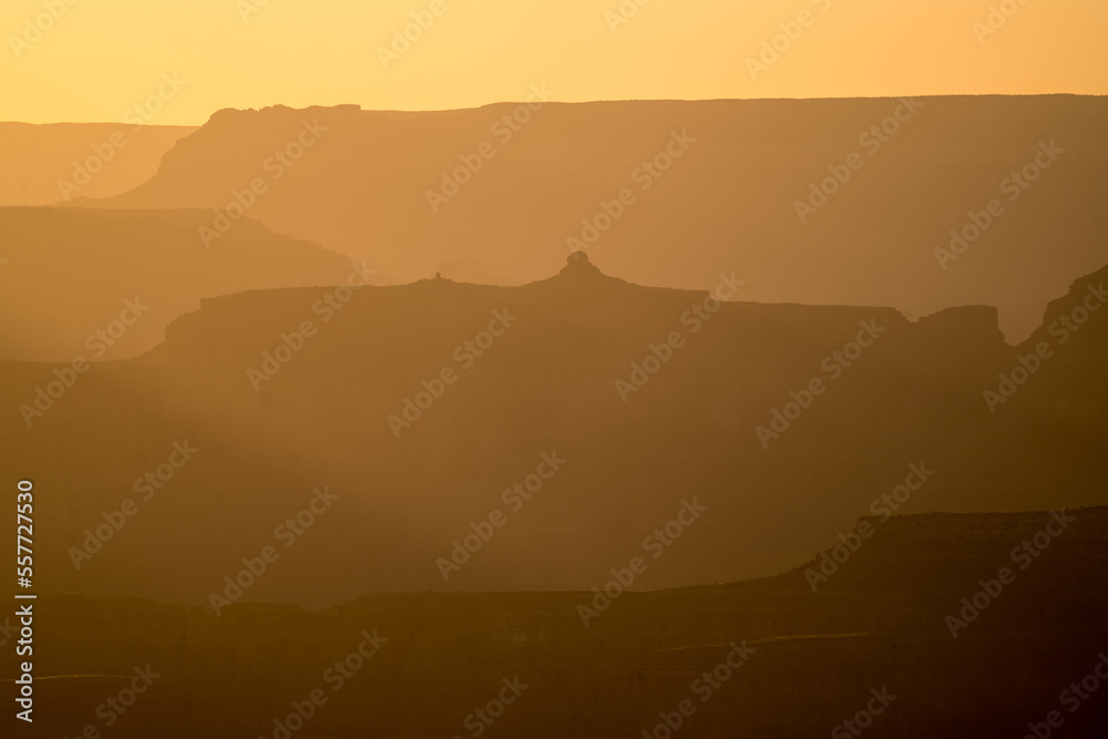 Sunset shadows over valleys of the Grand Canyon in USA, evening sunset silhouettes