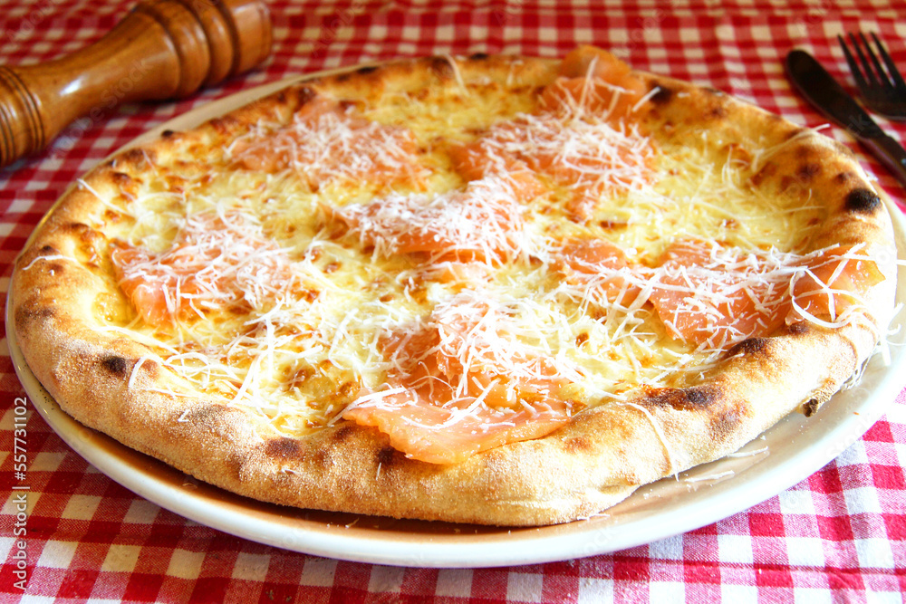 Salmon Pizza. Neapolitan pizza made with salmon and baked vegetables. Italian vegetarian recipe. Salmon Pizza. Neapolitan pizza made with salmon and baked vegetables. Italian vegetarian recipe.