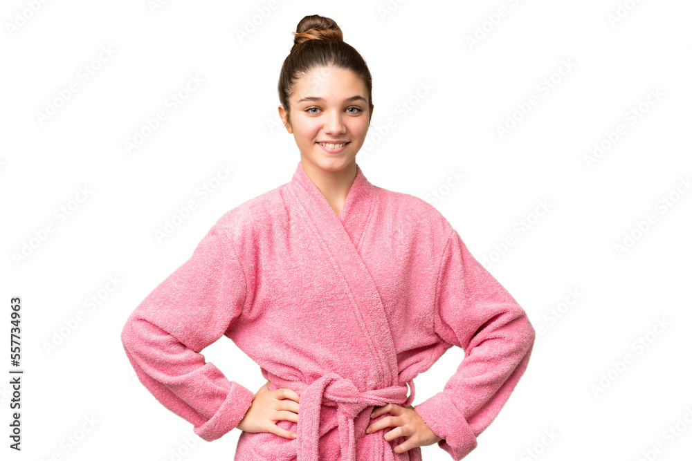 Teenager girl in a bathrobe over isolated chroma key background posing with arms at hip and smiling Teenager girl in a bathrobe over isolated chroma key background posing with arms at hip and smiling