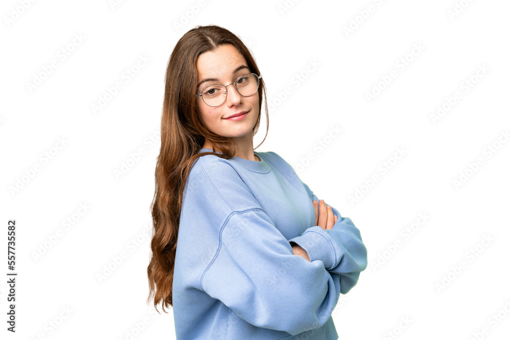 Teenager girl over isolated chroma key background with arms crossed and looking forward Teenager girl over isolated chroma key background with arms crossed and looking forward