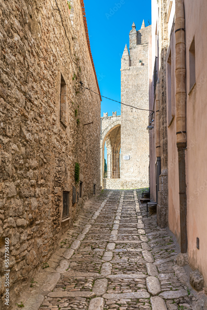 The small town of Erice with its stone houses and narrow, picturesque streets and alleys on the Mount Erice in the west of Sicily. The alley leads to the Chiesa Madre, the Cathedral of Erice