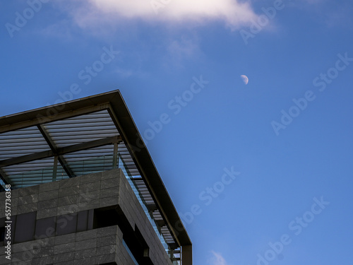 urban style builiding view with ablue sky and moon at abdali area at amman- jordan photo