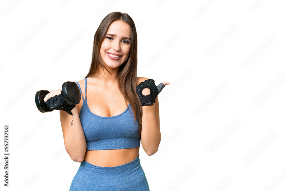 Young sport woman making weightlifting over isolated chroma key background pointing to the side to present a product Young sport woman making weightlifting over isolated chroma key background pointing to the side to present a product