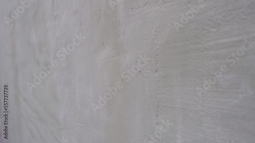Wallpaper Mural Gray structural painted wallpaper on the wall. Grunge texture background. Grungy painted wall with decorative parget gray stucco texture background. Structural plaster Torontodigital.ca