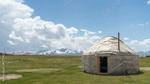 Traditional Yurt tent at the Song Kul lake plateau in Kyrgyzstan. Yurt tents are traditional, portable tents made of felt that are used as a form of accommodation in the country. photo