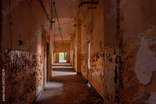 Old abandoned haunted red brick factory of stockings, pantyhose and socks in Central Europe, Poland