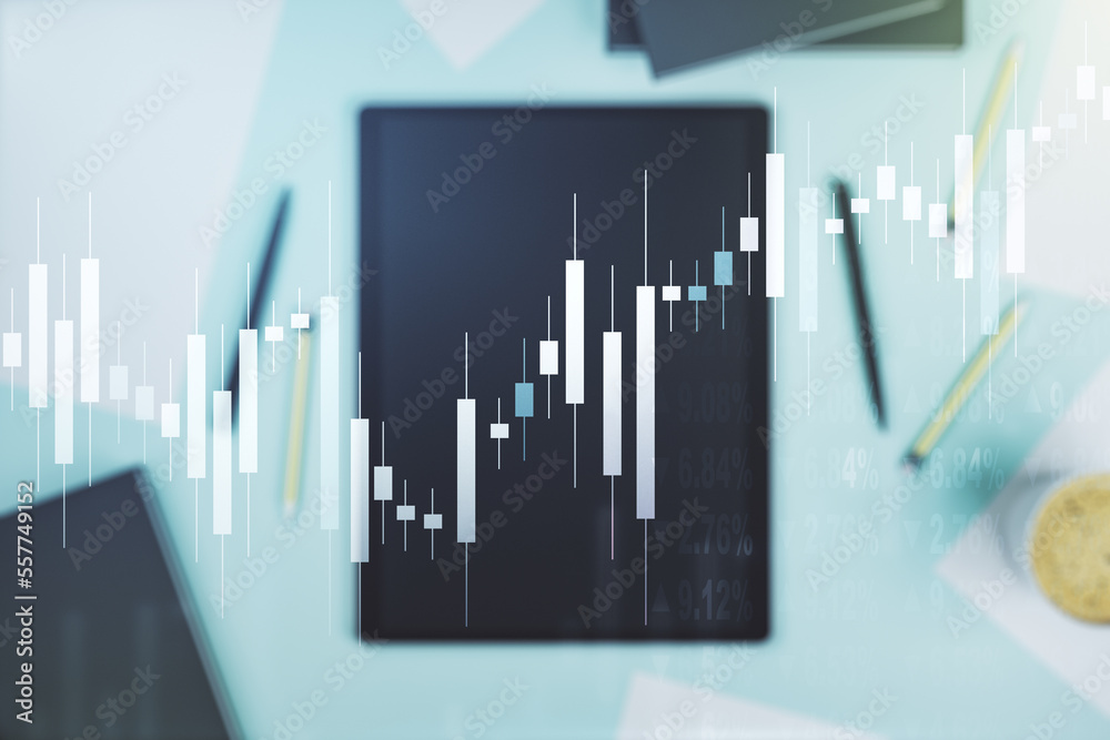 Multi exposure of abstract creative financial graph and modern digital tablet on background, top view, forex and investment concept Multi exposure of abstract creative financial graph and modern digital tablet on background, top view, forex and investment concept