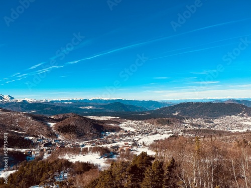 view from the winter mountains to a small village