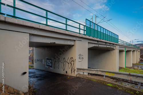 Railway bridge with green fence in centre of Usti nad Labem city