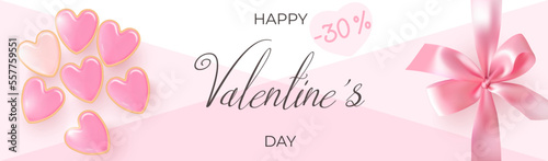 Discount banner with heart-shaped cookies and pink gift bow for Valentines Day