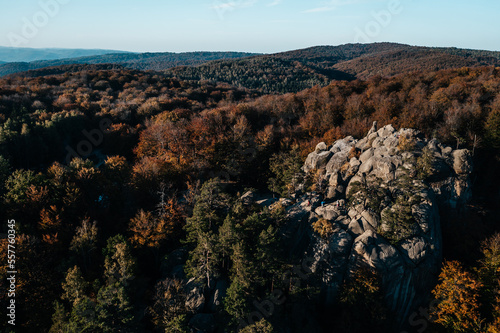 View of the Dovbush rocks from the mountain, a beautiful autumn landscape and a view of the Ukrainian nature reserve of the Dovbush rocks. © Niko_Dali