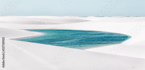 rainwater pond among the white sand dunes of Lencois Maranhenses photo