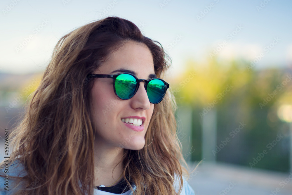 Portrait of a pretty girl in sunglasses