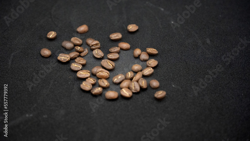 fresh coffee beans: Freshly roasted coffee beans on black background. delicious arabic coffees viewed from above