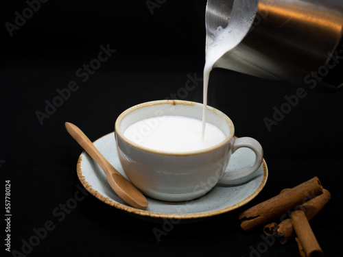 salep drink cafe cup art sahlep,
top view and cinnamon sahlep photo