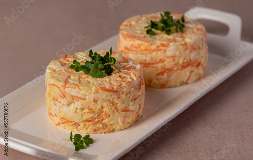 Food photography of cheese salad, eggs, carrot, garlic, mayonnaise