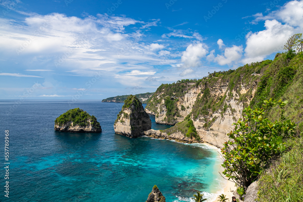 The beautiful sandy beach (Diamond beach) with rocky mountains and clear water in Nusa Penida, Bali, Indonesia