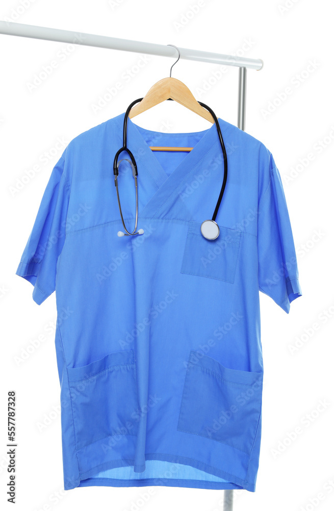 Light blue medical uniform and stethoscope on rack against white background Light blue medical uniform and stethoscope on rack against white background