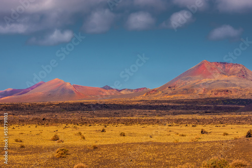 Wild volcanic landscape of Los Volcanes Natural Park in Lanzarote, Canary Islands, Spain