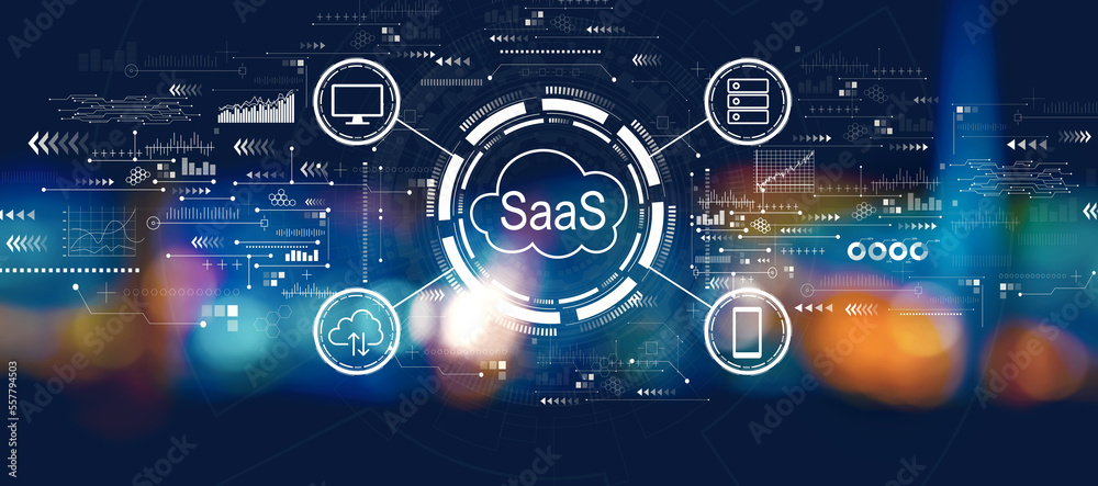 SaaS - software as a service concept with blurred city lights at night SaaS - software as a service concept with blurred city lights at night