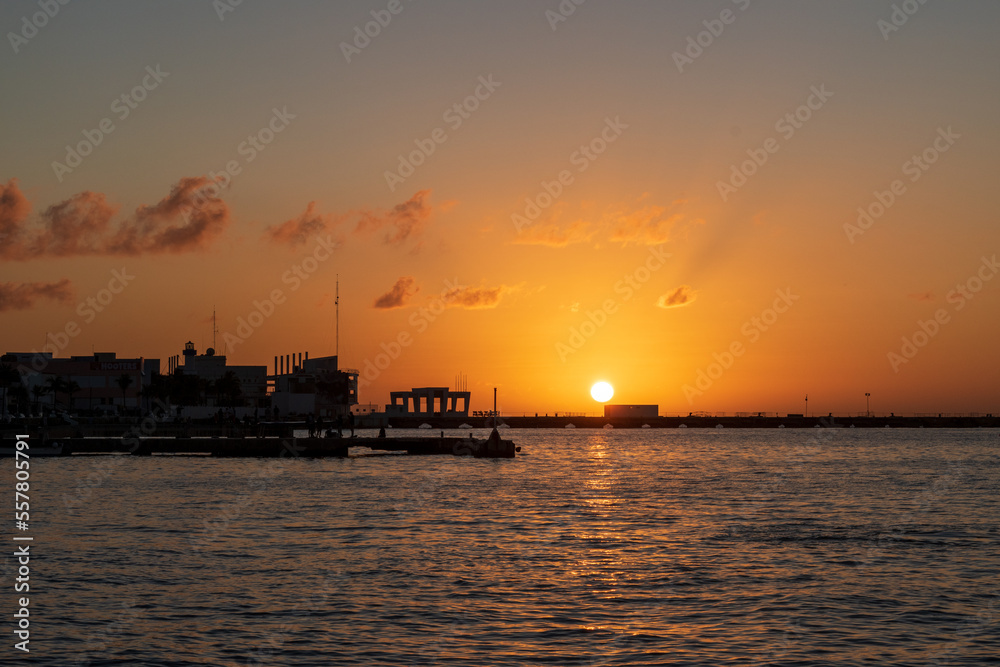 sunset over the sea in cozumel