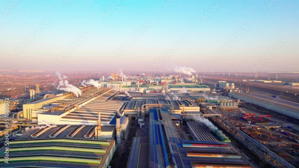 Aerial view of cooling towers of city factory chimneys Aerial view of cooling towers of city factory chimneys