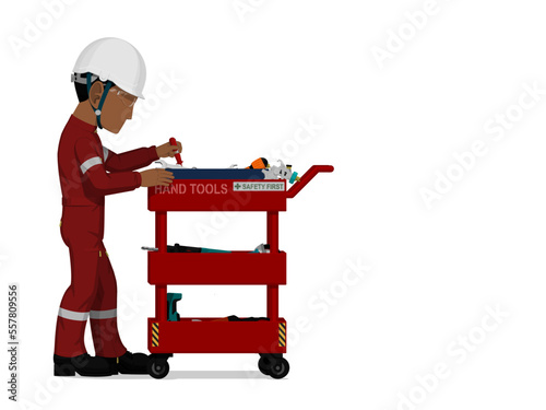 worker is finding some hand tools in the shelf