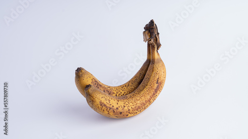 Rotten banana isolated on white background. Expired fruit.