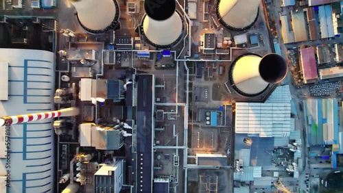 Aerial view of cooling towers of city factory chimneys